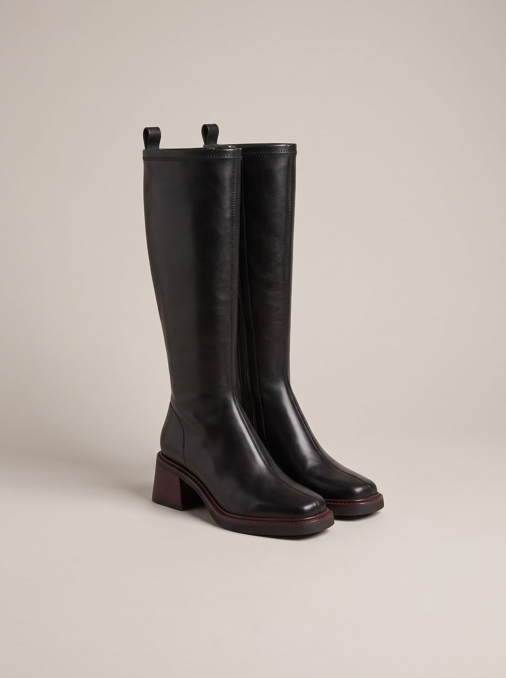 DOMINIQUE Block Heel Knee High Boots in black, front