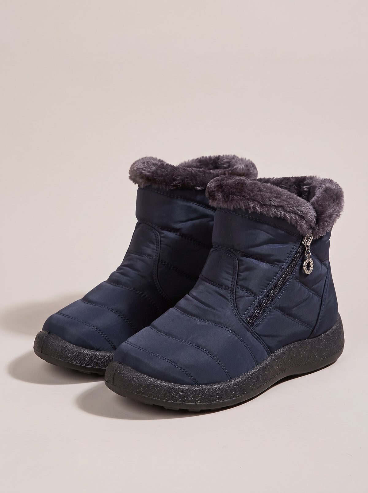 EMERY Quilted Faux Fur Ankle Snow Boots in blue, front