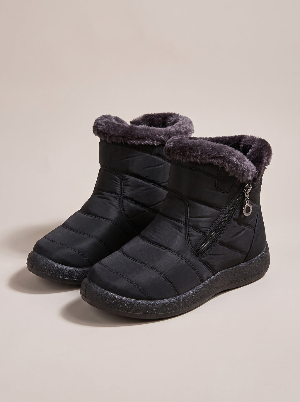 EMERY Quilted Faux Fur Ankle Snow Boots in black, front