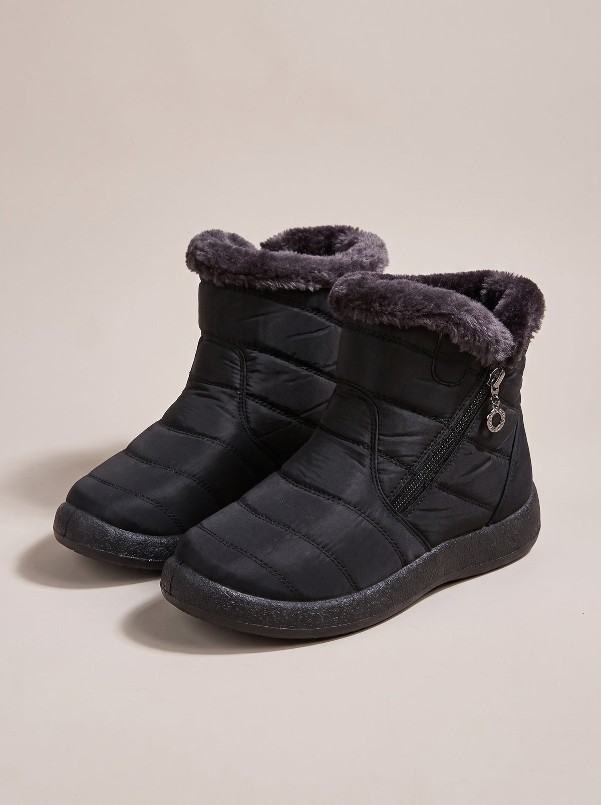 EMERY Quilted Faux Fur Ankle Snow Boots in black, front
