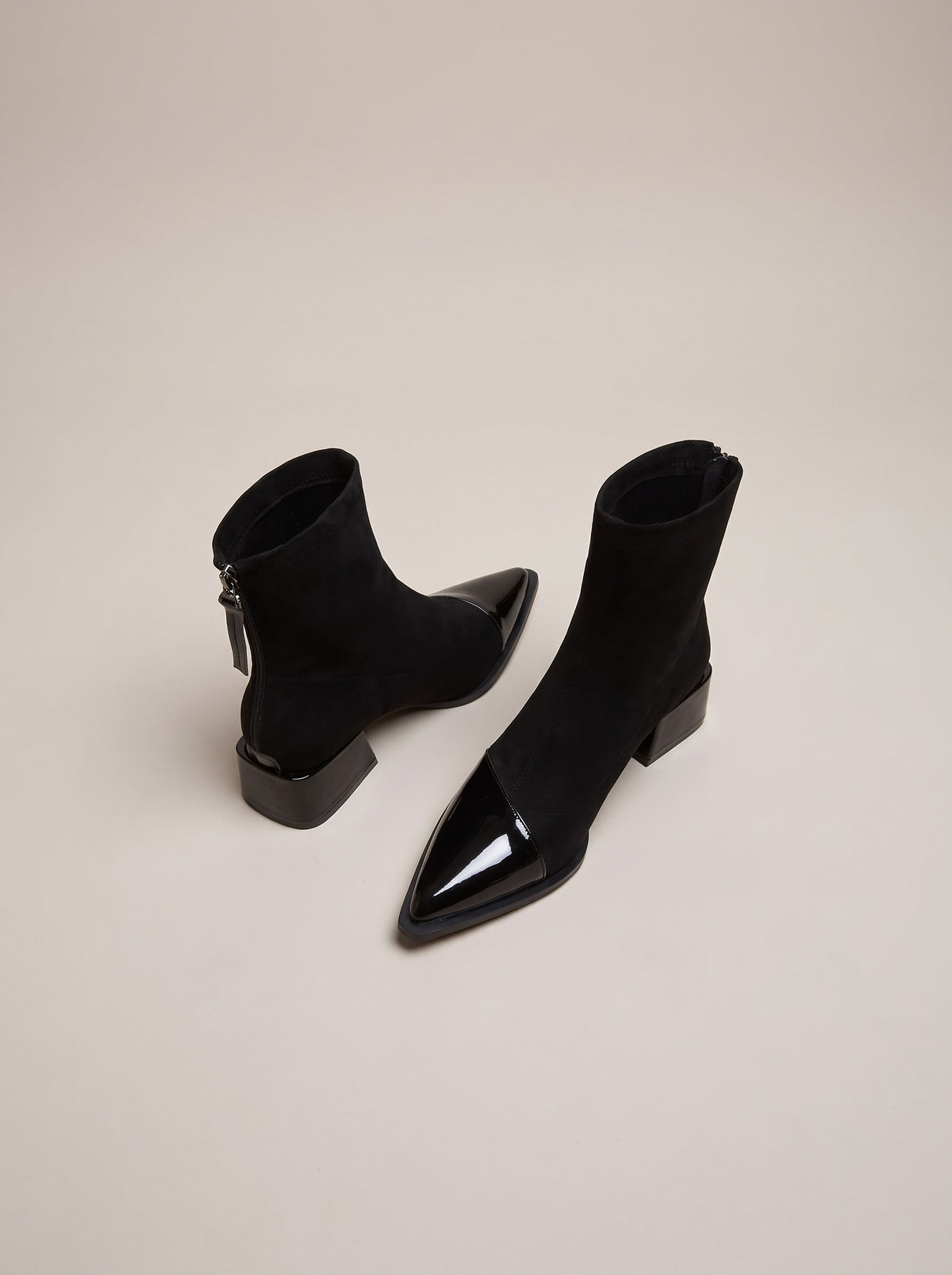 ODALYS Pointed Toe Faux Suede Ankle Boots in black, front