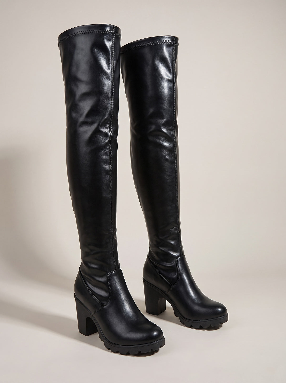 PARKER Stretch Over The Knee Heeled Boots in black block heel, front