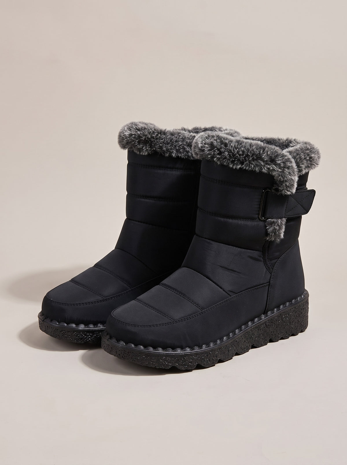 TEAGAN Quilted Faux Fur Snow Boots in black, front