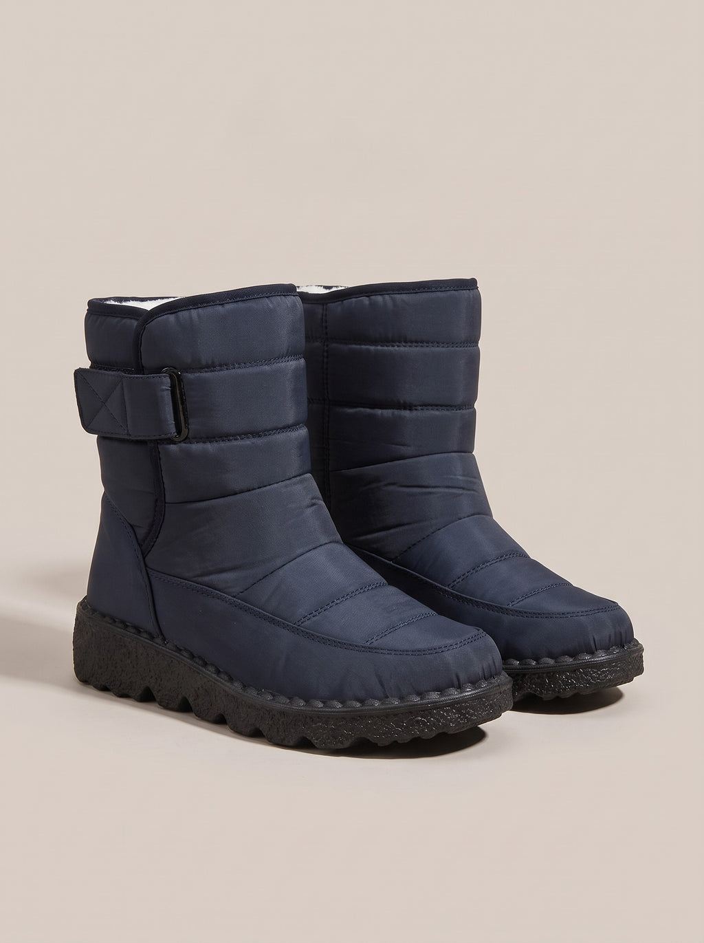 ZOEY Quilted Waterproof Snow Boots in blue, front